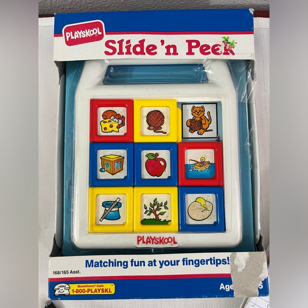 Vintage Playskool Slide n Peek NOS